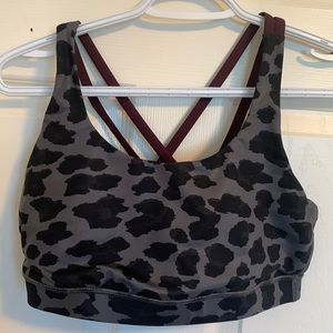 Lululemon sports bra in black animal print with maroon trim